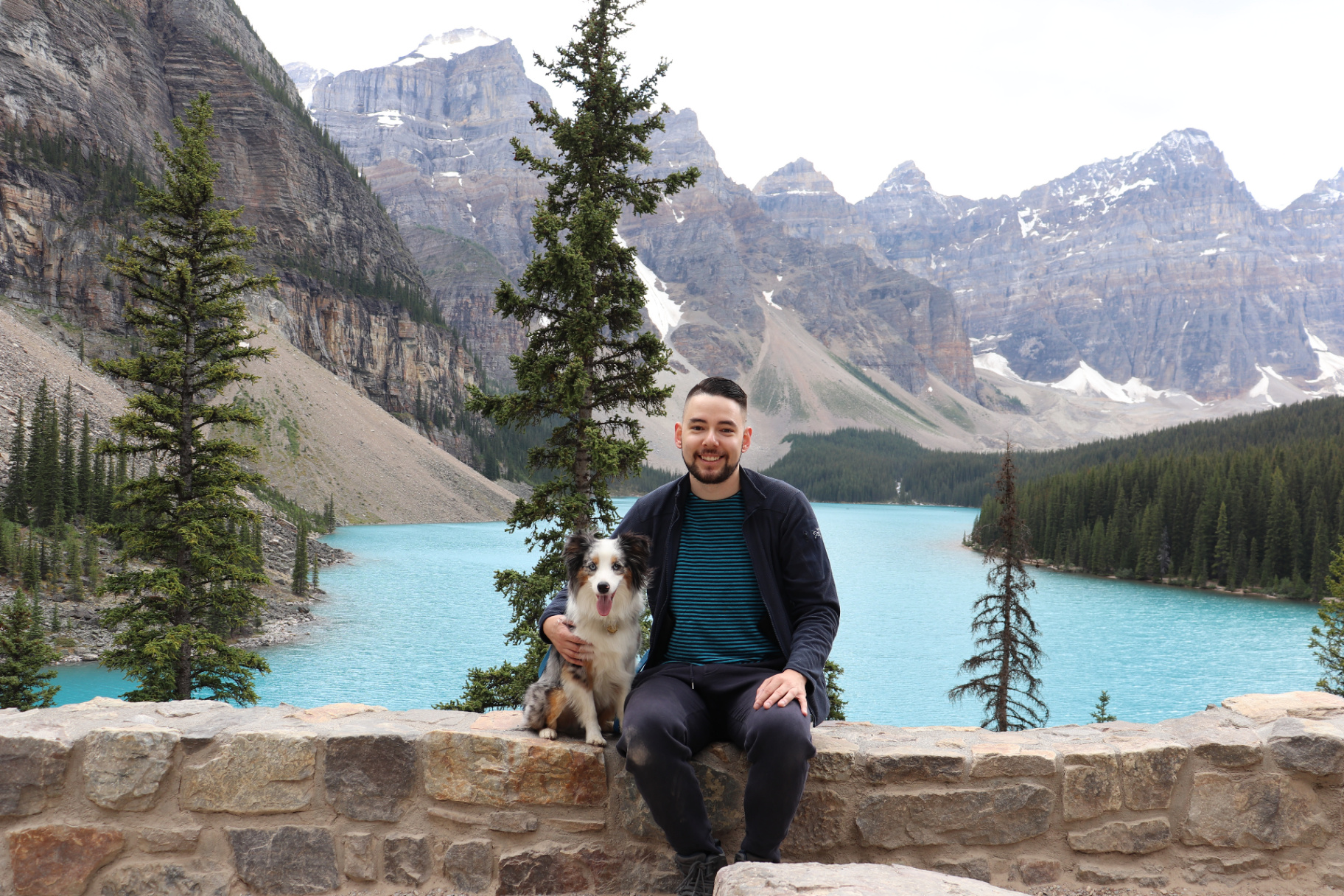 Benji Litonjua with Otis, the Mini Aussie that inspired the agency name